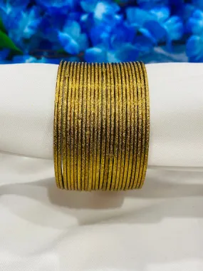 Lovely Glittery Gold Plated Designer Party Wear Thin Metal Bangle Sets