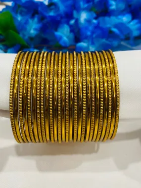 Magnificent Antique Gold Partywear Thin Bangles With Plain Running Dots